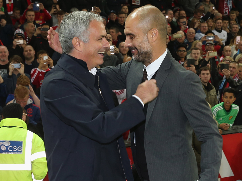 試合前、笑顔の両指揮官　[写真]＝Man Utd via Getty Images