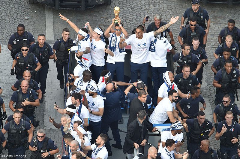France's World Cup Winning Team Parade Down The Champs Elysees