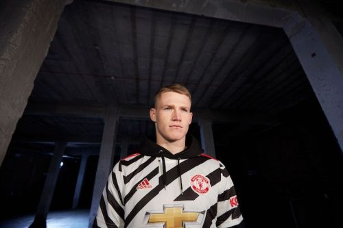 MCTOMINAY WEARS UNITED THIRD JERSEY