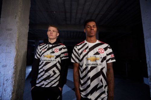 RASHFORD AND MCTOMINAY WEAR UNITED THIRD JERSEY