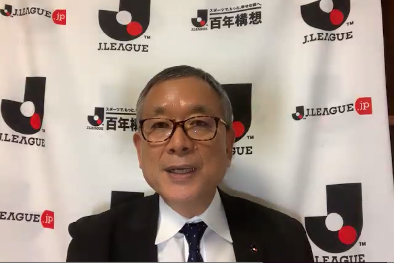 村井満